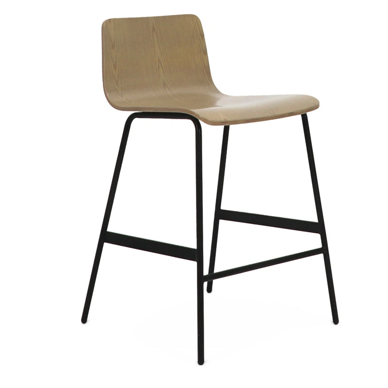 Three-quarter view of Mod stool highlighting smooth wood grain texture and steel base